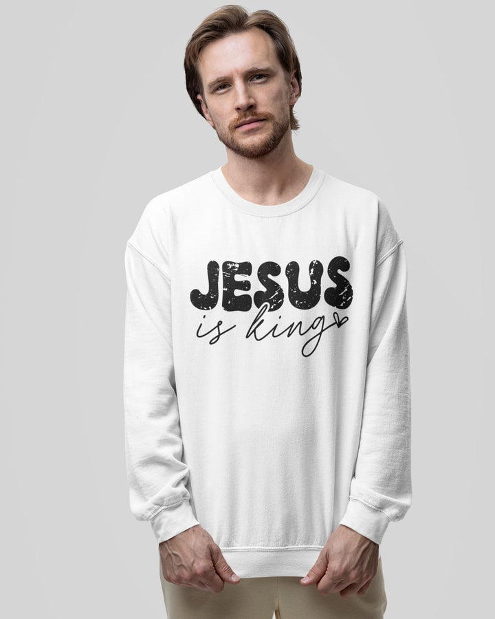 Man wearing white Jesus Is King Christian sweatshirt, front view.
