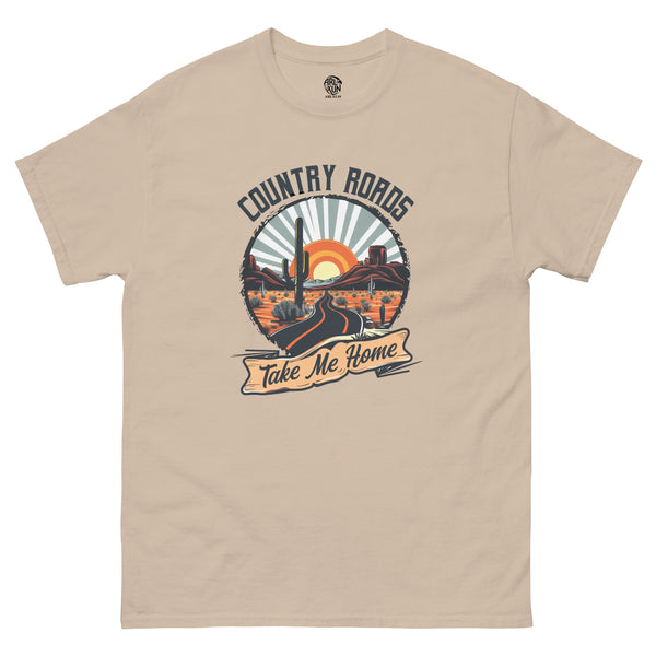 Beige t-shirt with 'Country Roads, Take Me Home' graphic design on a white background