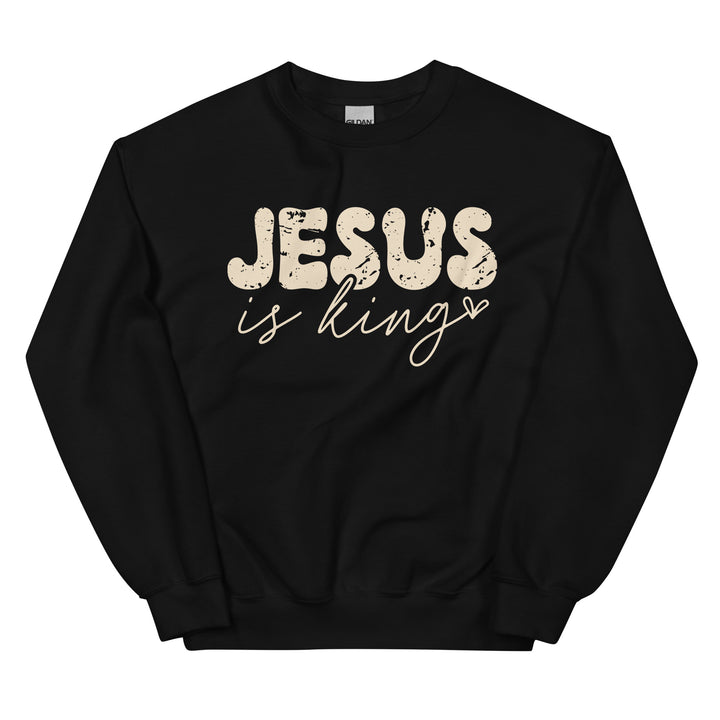 Black Christian sweatshirt with Jesus Is King text on the front, laid flat on a neutral background.