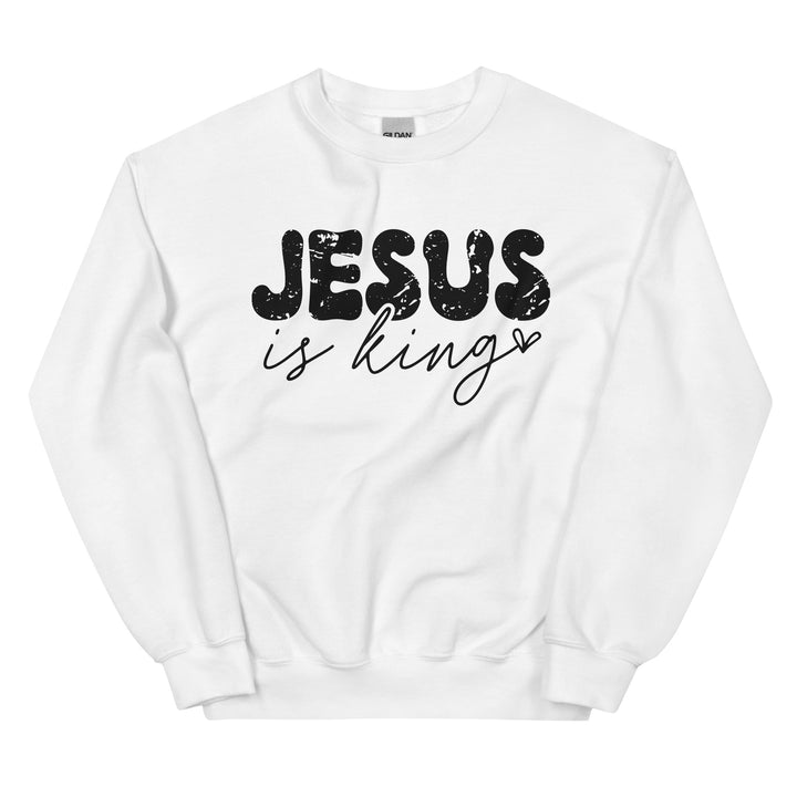 White Christian sweatshirt with Jesus Is King text on the front, laid flat on a neutral background.